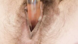 Hairy Pussy Playing with Glass Dildo on last Day of Period