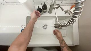 In-Home Massage Therapist Austin Wolf Washes Hands