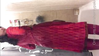 Pakistani girl in shalwar kameez bathing