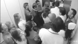 Doctor Groping Nurse In Elevator Full Of People