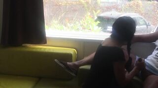 Wife giving risky blowjob in front of window in a camper van