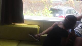 Wife giving risky blowjob in front of window in a camper van