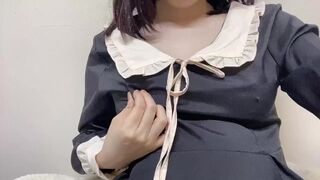 Japanese girl in cute outfit masturbates