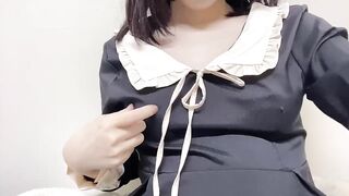 Japanese girl in cute outfit masturbates