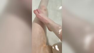 Cute teen plays with her little feet