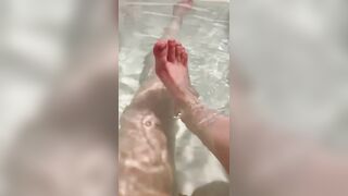 Cute teen plays with her little feet