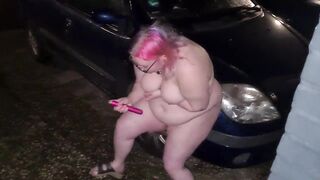 She lost a bet. Masturbating naked in the front yard.