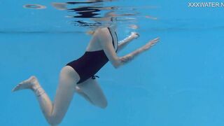 Finnish teen babe Mimi Cica cutest pornstar with tattoos in swimming pool nude