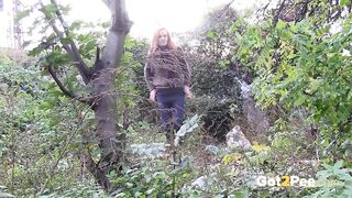 Redheaded Babe Pisses Long And Hard In Trees