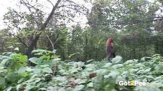 Redheaded Babe Pisses Long And Hard In Trees