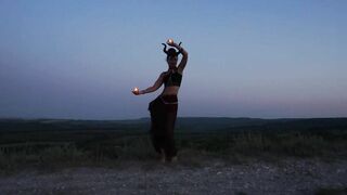 Candels Dance against the background of the night sky