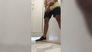 beach guy took a long piss at a public toilet