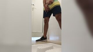 beach guy took a long piss at a public toilet