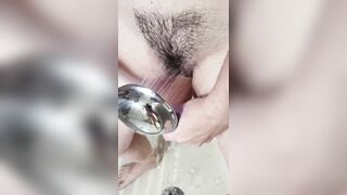 Anita Coxhard masturbates in the shower until she screams in ecstasy.