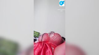 Watch nasty Susi lying on back playing with toy between tits