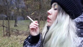 stepsister smokes in the woods before blowjob