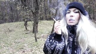 stepsister smokes in the woods before blowjob