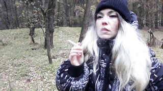 stepsister smokes in the woods before blowjob