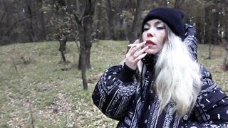 stepsister smokes in the woods before blowjob