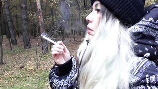 stepsister smokes in the woods before blowjob