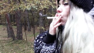 stepsister smokes in the woods before blowjob