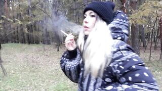 stepsister smokes in the woods before blowjob