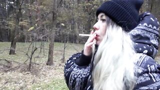 stepsister smokes in the woods before blowjob