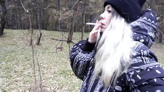 stepsister smokes in the woods before blowjob