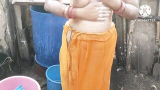 Anita yadav bathing outside with hot