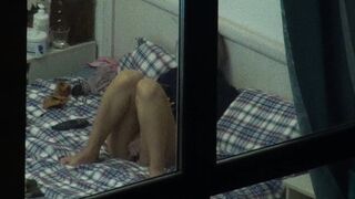 Hot girl masturbating on bed voyeur window