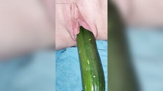 Penetration wet pussy by big cucumber