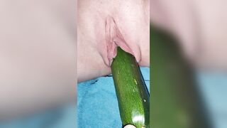 Penetration wet pussy by big cucumber