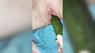 Penetration wet pussy by big cucumber