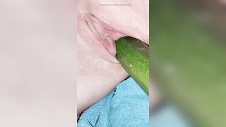 Penetration wet pussy by big cucumber