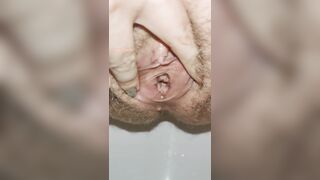 Extremely close up wide open hairy pussy pissing for your pleasure