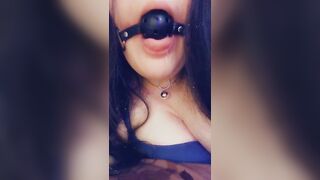 Drooling through my ball gag onto my bed