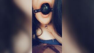 Drooling through my ball gag onto my bed