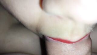 CLOSE UP: red lipstick blowjob