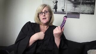 Mature Teacher confiscates a glass dildo and uses it.